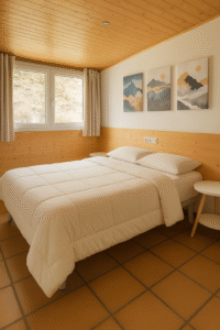 habitación doble hostal Yeti en Sierra Nevada con baño privado